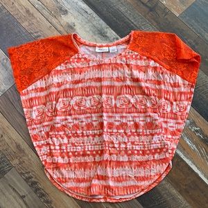 Color adds fun! Orange short sleeve!